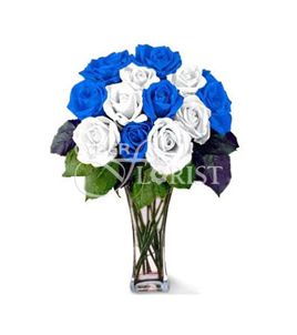 arrangement of blue and white roses